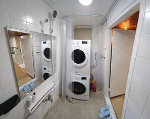 Shower, hair dryer, towels, soap