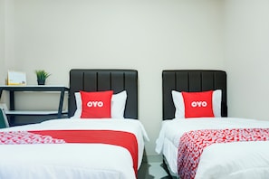 Chambre Deluxe avec lits jumeaux | Bureau, Wi-Fi gratuit, draps fournis