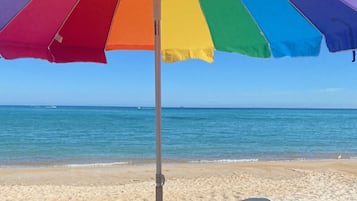 On the beach, sun loungers
