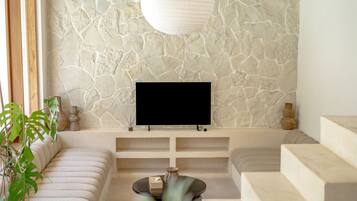 Villa, 2 Bedrooms, Patio, Pool View | Living room | 50-inch TV with cable channels