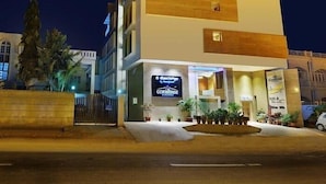 A modern hotel with a two-story structure, a visible entrance, and a sign for 'Coraltree'. - Coral Tree (Bengaluru)