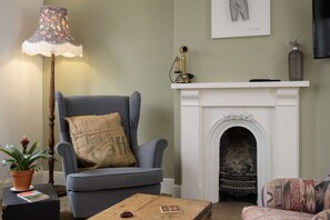TV, fireplace, books, stereo