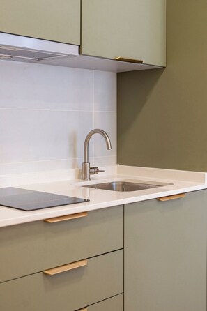 Fridge, microwave, stovetop, coffee/tea maker