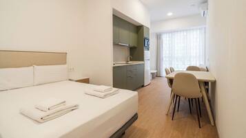 Fer et planche Ă repasser, lit parapluie, Wi-Fi gratuit, draps fournis