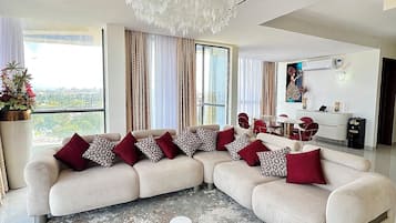 Executive Suite, 2 Bedrooms, Garden View | Living area | Smart TV
