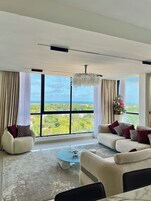 Executive Suite, 2 Bedrooms, Garden View | Living area | Smart TV