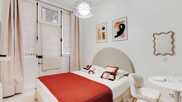 Departamento | 1 habitación, tabla de planchar con plancha y ropa de cama