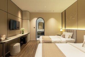 Habitación Deluxe con 2 camas individuales | Caja de seguridad en la habitación, wifi gratis y ropa de cama