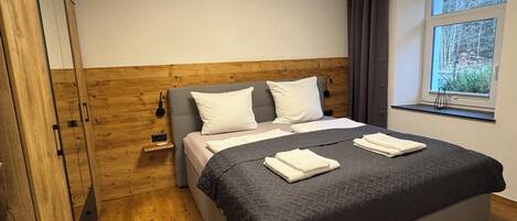 2 slaapkamers, een strijkplank/strijkijzer, wifi, beddengoed