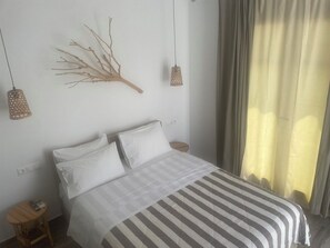 Deluxe Double Room, Partial Sea View | In-room safe, blackout drapes, soundproofing, iron/ironing board - Theofanis on the beach (Naxos)