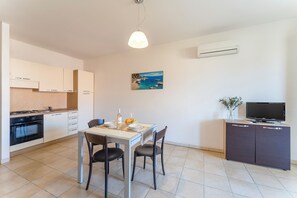Comfort Apartment, Balcony | Living area