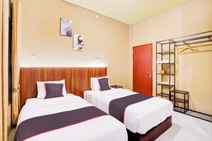 Chambre Deluxe avec lits jumeaux | Bureau, accès au Wi-Fi (inclus), literie fournie