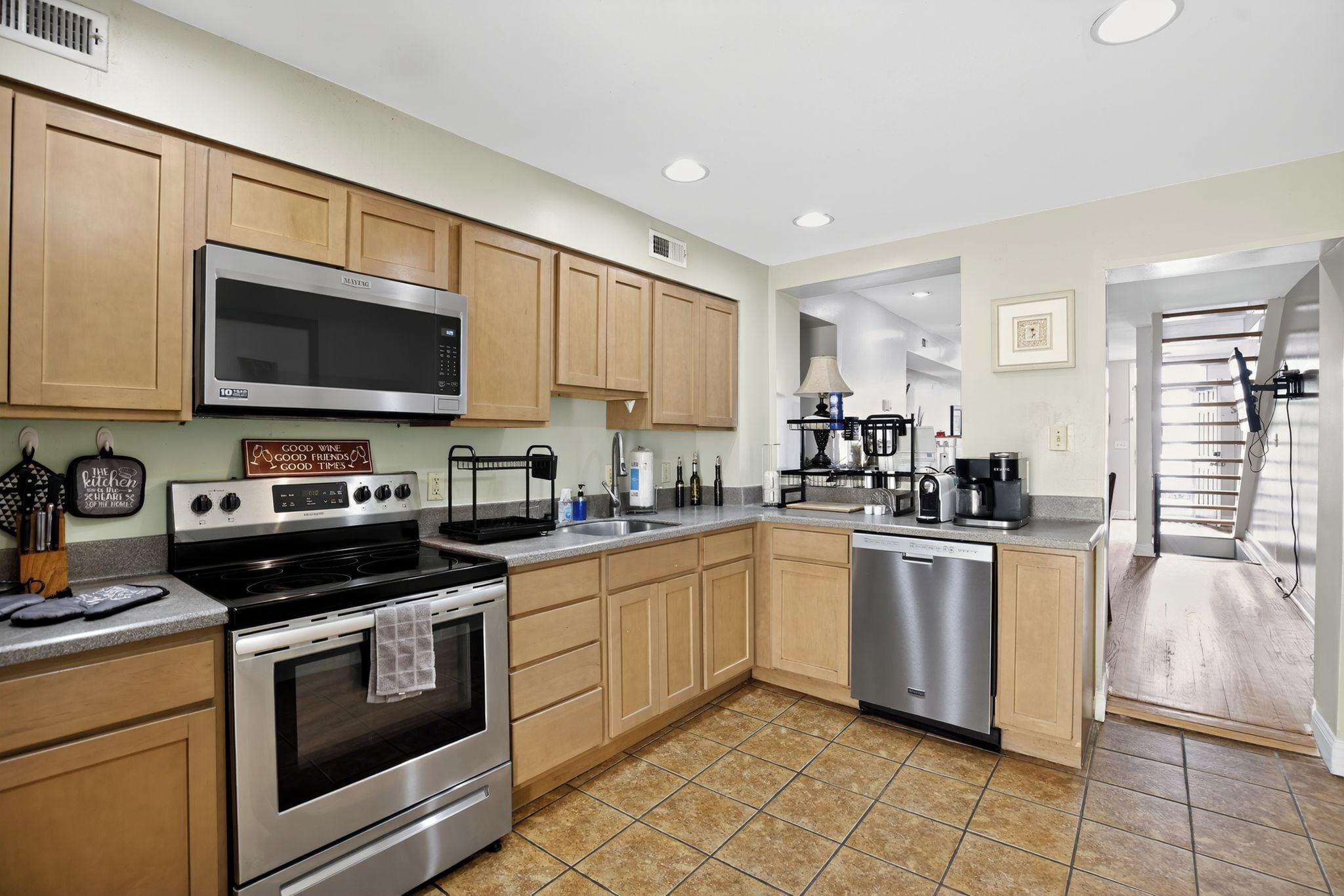 Full-sized fridge, microwave, oven, dishwasher