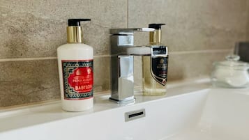 Hair dryer, towels, soap, shampoo