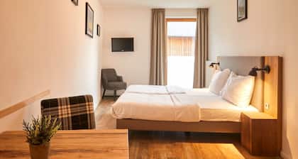 Hotel room with breakfast at Dormio resort Obertraun