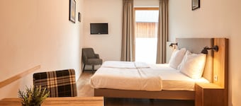 Hotel room with breakfast at Dormio resort Obertraun