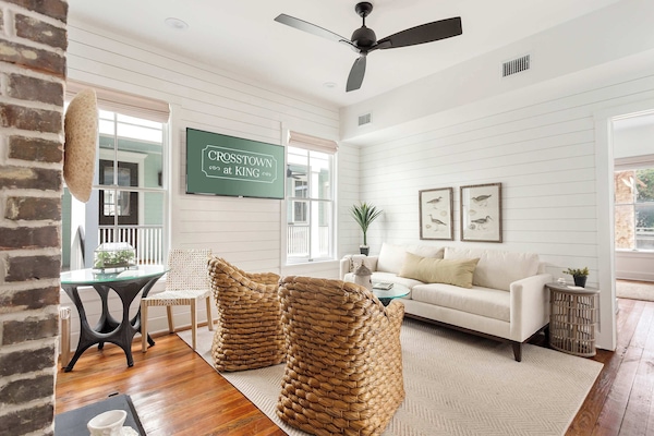Welcome to your downtown Charleston rental! Explore all things downtown by foot! Spacious living room with seating for your entire group