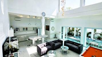 Luxury Villa, Private Pool | Living area | 85-inch LED TV with cable channels, video game console, Netflix