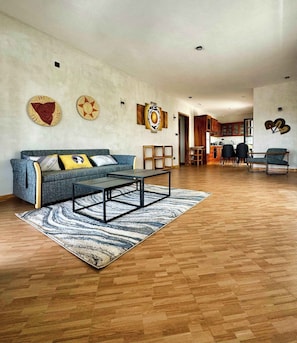 Family Apartment, Balcony, Mountain View | Living area | 32-inch TV with satellite channels - Moshono Hillside  (Arusha)