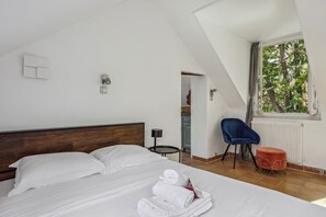 1 bedroom, desk, iron/ironing board, travel cot