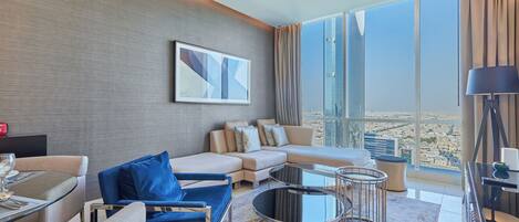 Premium Apartment, City View | Living room | 55-inch Smart TV with satellite channels