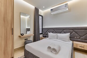 Premium Apartment, 3 Bedrooms | In-room safe, blackout drapes, iron/ironing board, free WiFi