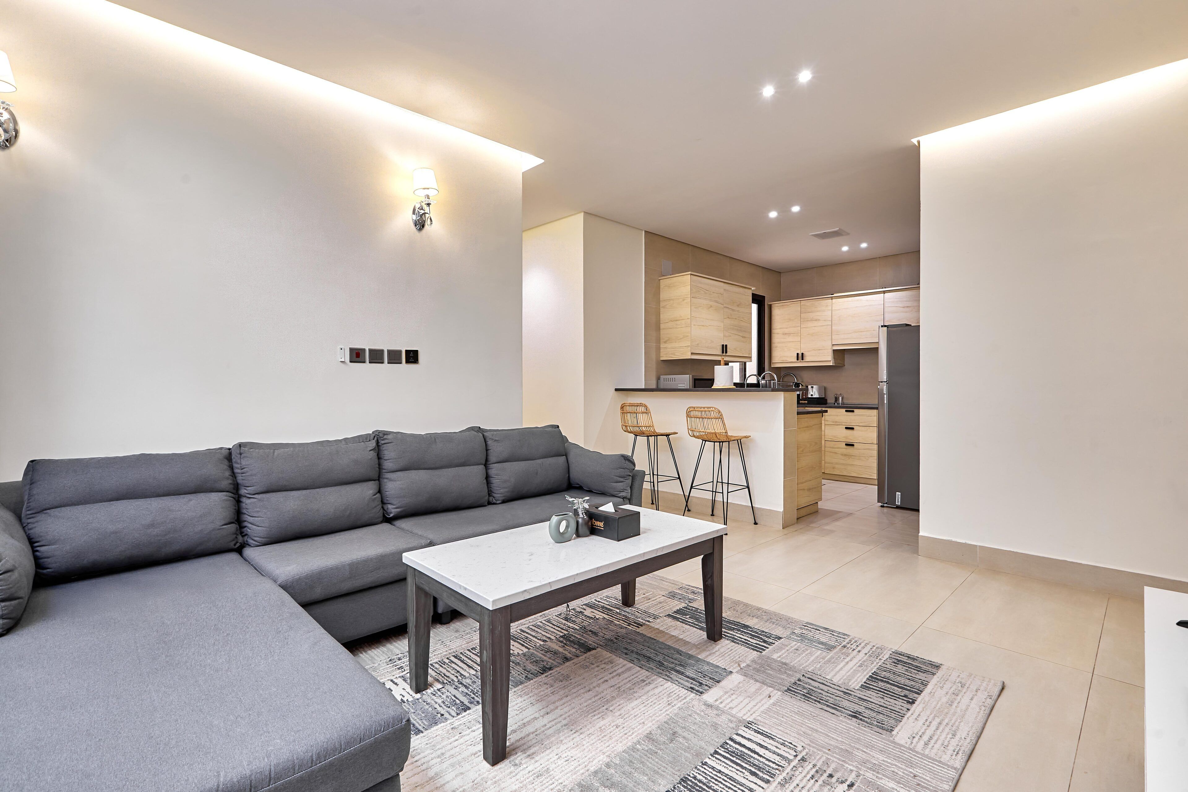 Premium Apartment, 3 Bedrooms | Living room | 45-inch Smart TV with satellite channels