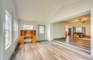 Spacious interior with a functional workspace and comfortable living area.