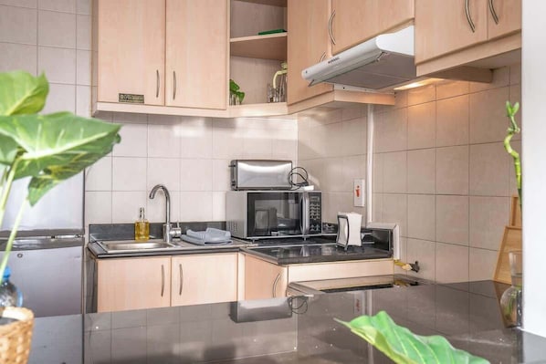 Fridge, highchair, cookware/dishes/utensils