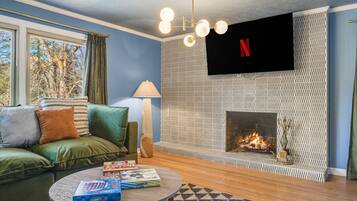Smart TV, fireplace, table tennis, books