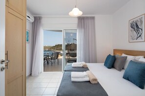 1 bedroom, desk, iron/ironing board, travel crib