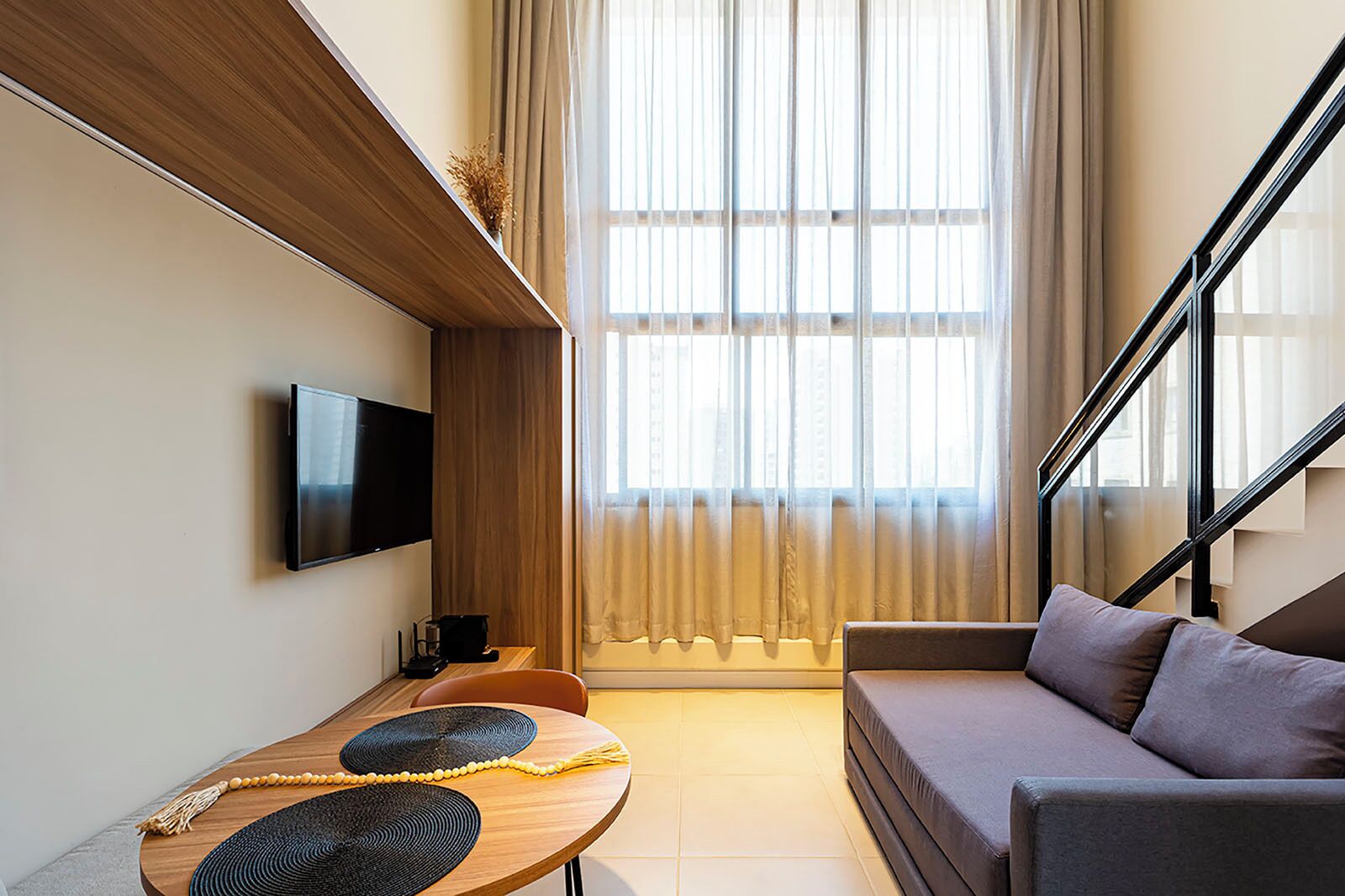 Deluxe Studio, City View | Living area | Flat-screen TV