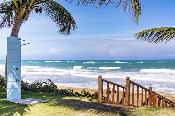 On the beach, sun-loungers, beach towels