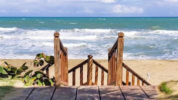 On the beach, sun loungers, beach towels