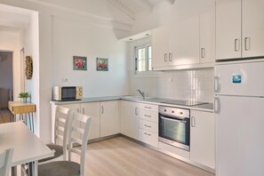 Fridge, microwave, oven, high chair