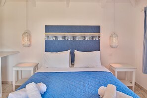 2 habitaciones, tabla de planchar con plancha y cuna de viaje 