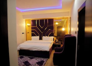Deluxe Room, Balcony, City View | Desk, laptop workspace, free WiFi