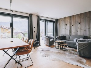 Luxury Condo, Mountain View | Living area | Flat-screen TV - Apartment Alpinero 405 by we rent (Piesendorf)