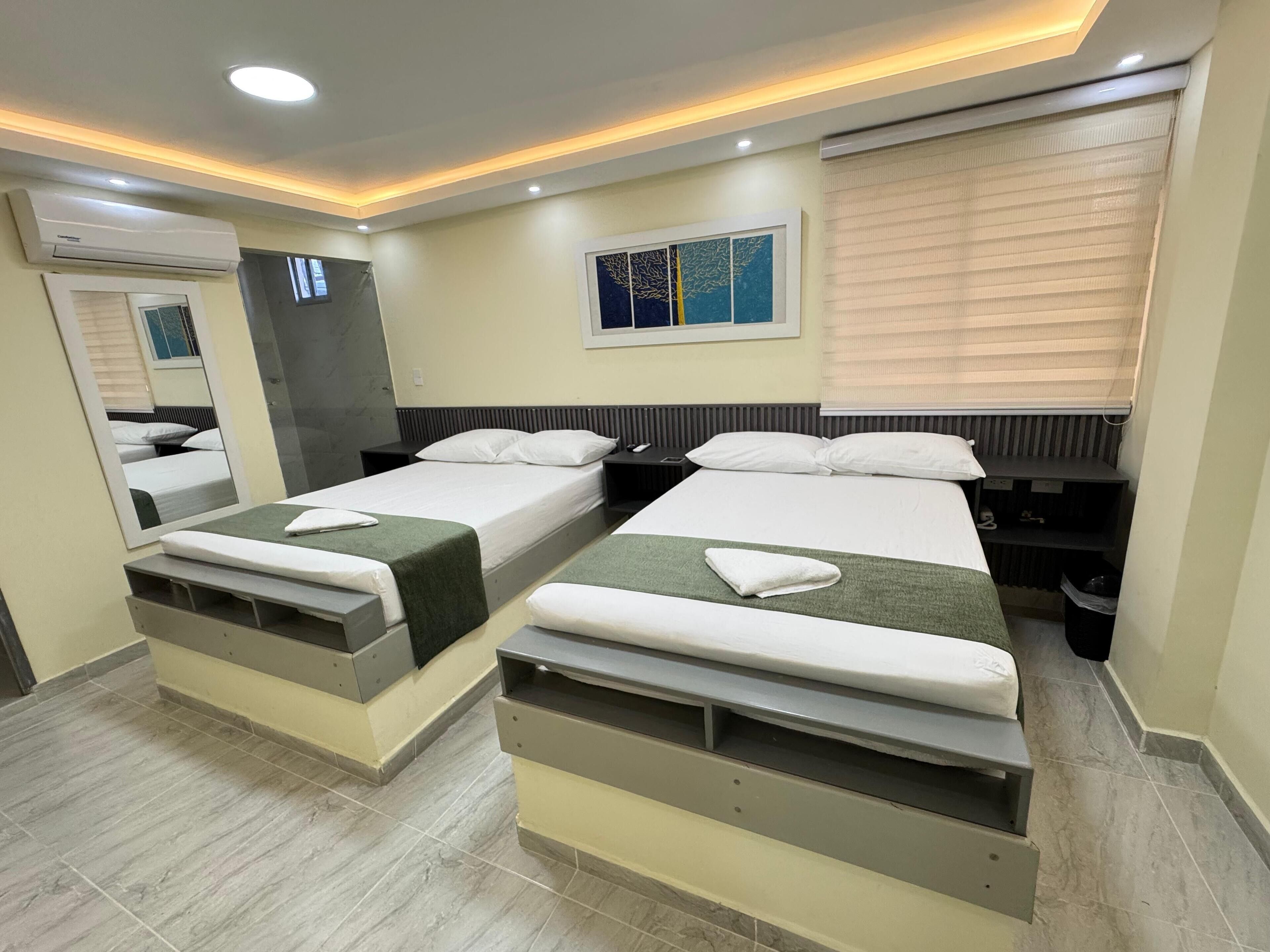 Kolmen hengen perhehuone | Ilmainen Wi-Fi, vuodevaatteet