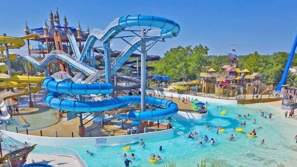 A water park with multiple water slides and pools. - 4 2 wow 180 Lake Views hot tub Pickleball Tennis POA Court EV Charger Wheelchair Ramp POA Pool (Canyon Lake)