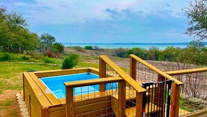 A wooden deck with a hot tub overlooking a scenic landscape. - 6bed 4bath 3 Acres With 18i0 Degree Views Pool Firepit (Buchanan Dam)