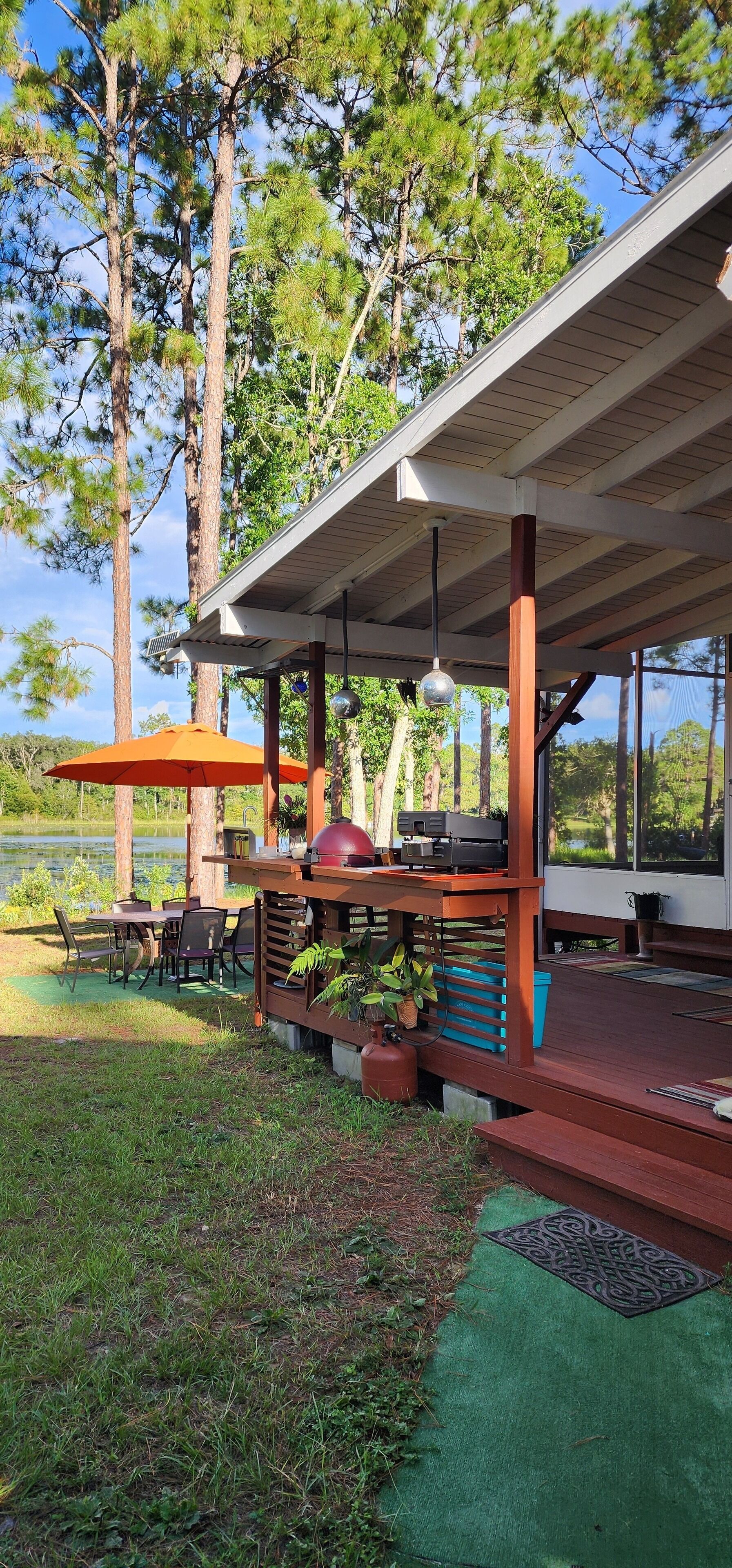 Fish Porch with backyard dining behind