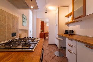 Deluxe Apartment, Balcony, Lake View | Private kitchen | Espresso maker, coffee/tea maker, high chair