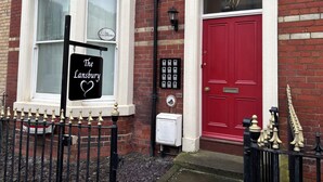 A red door with a sign above it reading "Lansbury 29". - The Lansbury - Whitby  (Whitby)
