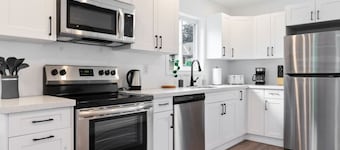 Modern 4BR Coach House | Near Beach & Downtown