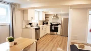 Fridge, stovetop, coffee/tea maker, cookware/dishes/utensils