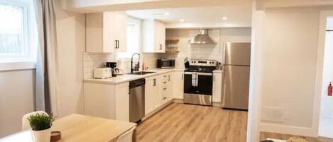Fridge, stovetop, coffee/tea maker, cookware/dishes/utensils