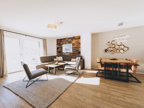 Superior Condo, Balcony, Mountain View | Living area | Flat-screen TV