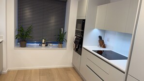 Fridge, microwave, oven, stovetop - Modern 4-bedroom townhome in Patchway (Patchway)