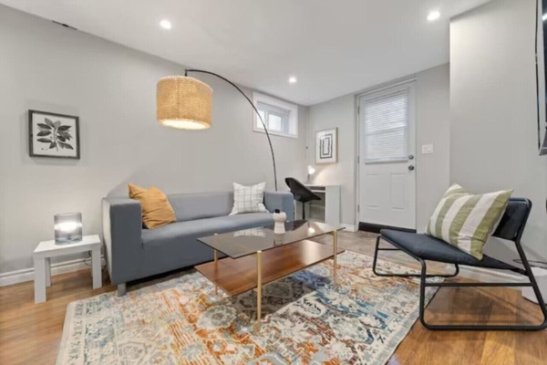 As you take a seat in the living room, the comfortable furniture and tasteful design make it easy to unwind.